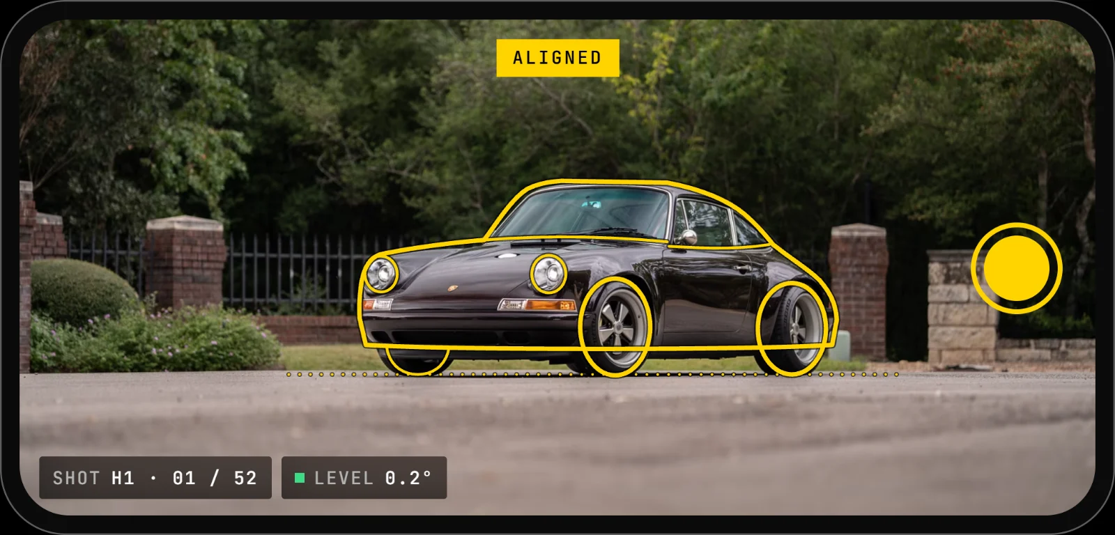 The ThreeQuarter camera on a phone in landscape. A yellow outline sits aligned over a Porsche 911 at the front hero angle.
