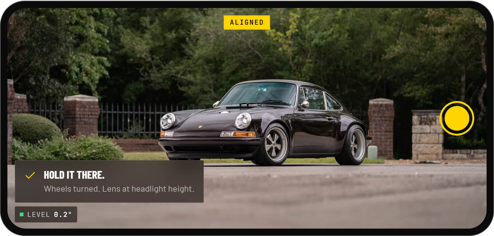 The ThreeQuarter camera in landscape, aligned on a car at the front hero angle. A coaching tip says hold it there, the level reads 0.2 degrees.